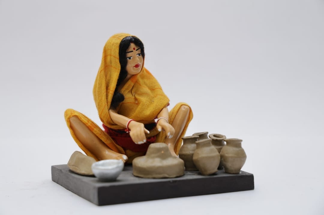 Village Worker (Lady making pottery)