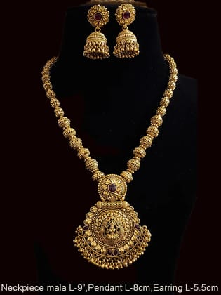 Circular top with ruby stone laxmiji pendant in matar bead string set