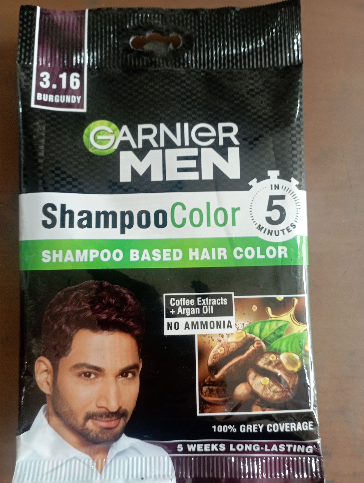 Garnier man shampoo based hair color