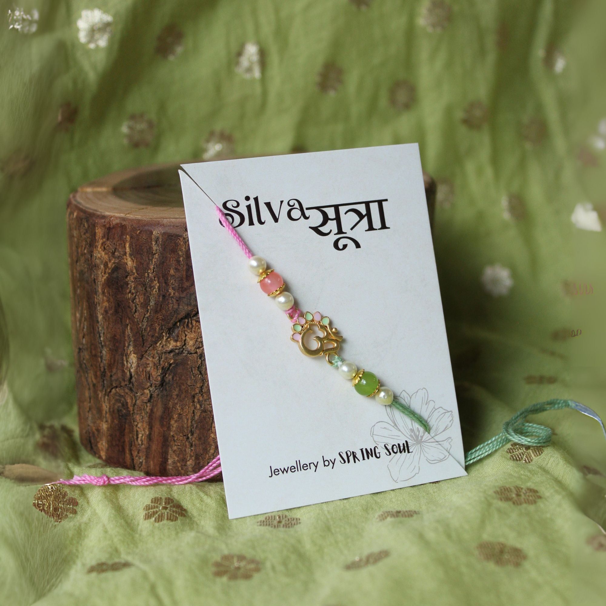 OM beaded rakhi in pink