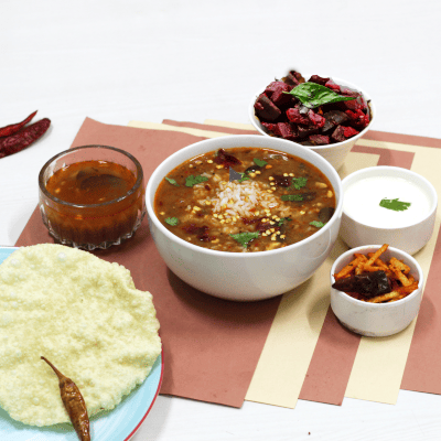 Rasam and poriyal rice bowl
