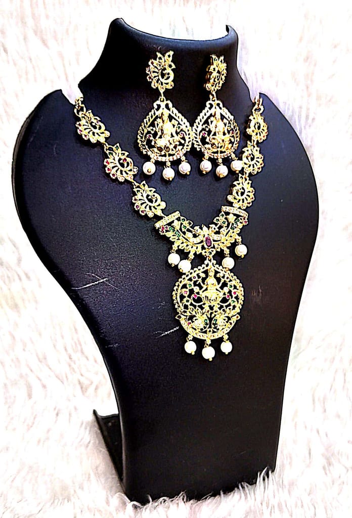 Gold-plated, pearl, and green stone necklace set