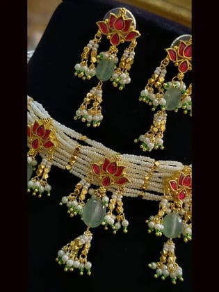 Five lotus paachi kundan choker set with aqua green drops