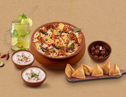 1 KG Veg Shahi Matka Biryani + Dessert + Starter + Drink