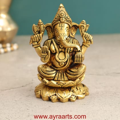 Brass Fine Art Ganesha Sitting On Lotus Base - 4 Inch Height Brass Fine Art Ganesha Sitting On Lotus Base - 4 Inch Height
