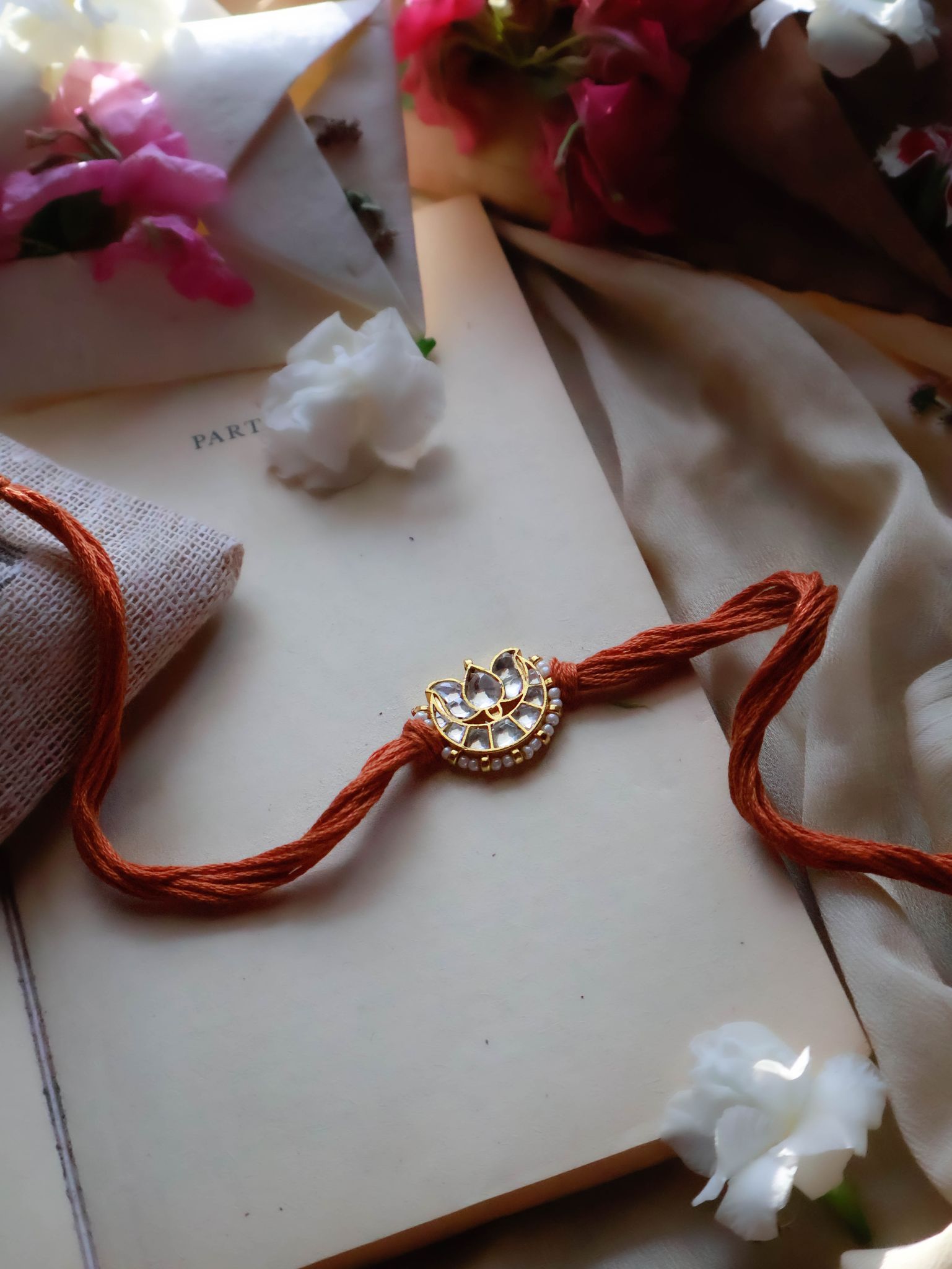 Bheem Lotus Rust Kundan Rakhi-Orange