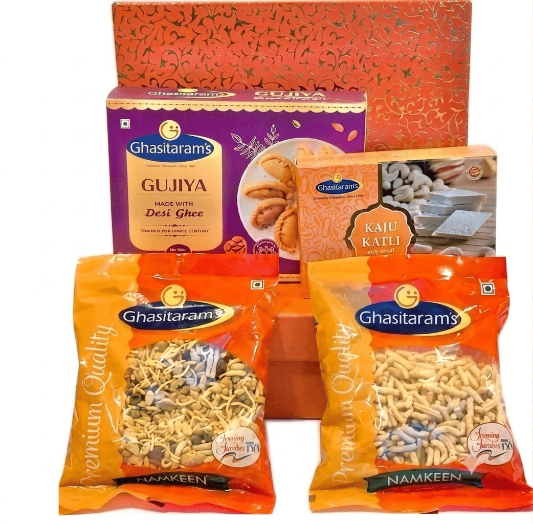 Ghasitaram's Rakhi Special Hamper Gujiya 400g, Kaju Katli 100g, 2 Namkeen Packets with free Organic Colour