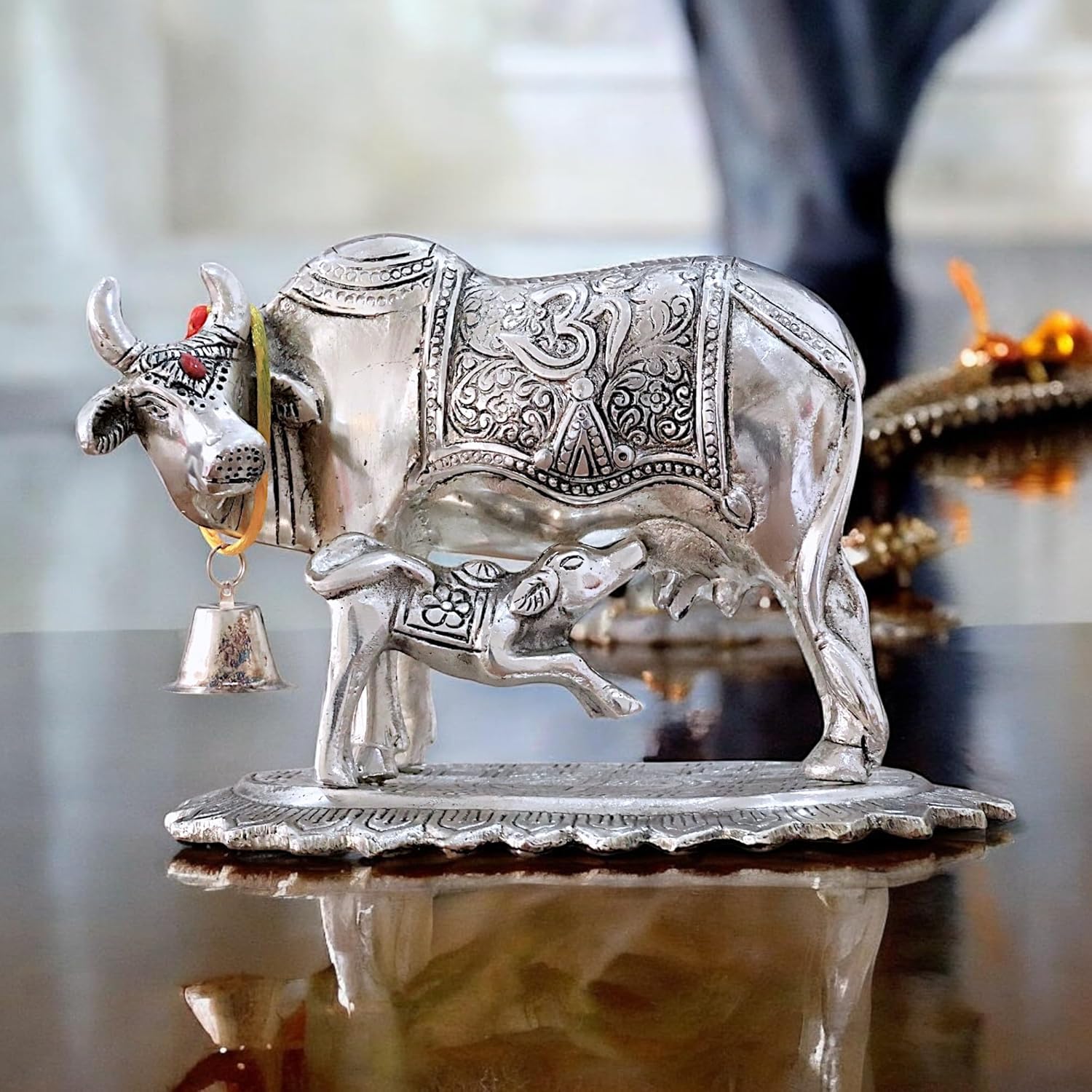 Dreamkraft Metal Om Kamdhenu Cow and Calf Statue Idol for Home, Office & Table Decoration| Silver Finish (12.5 cm)