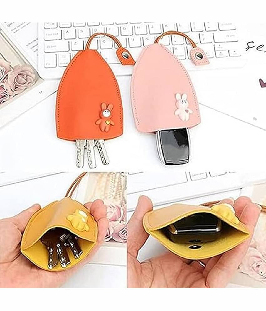 RAMDEV ENTERPRISE Multicolor Leather Creative Pull Out Large Capacity Key Case.