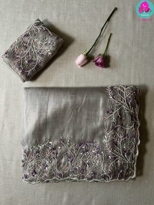Soft tissue grey saree with embroidered sequins work