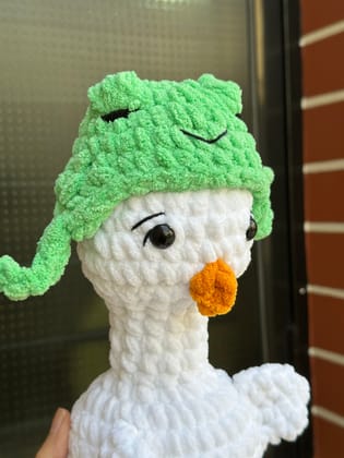 Goose with frog hat plushie