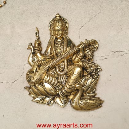 Pure Brass Lotus Saraswati Wall Hanging Frame - 10 Inch Height Pure Brass Lotus Saraswati Wall Hanging Frame - 10 Inch Height