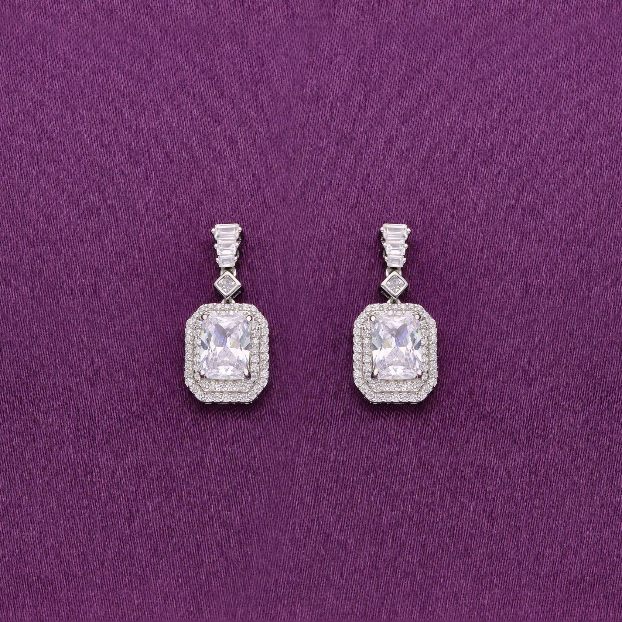 Shimmering Zircon Studded Baguette Silver Drop Earrings-White Stone / Silver