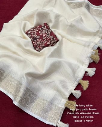 Soft kota doria saree with zari pattu woven border.Cotton tassels on pallu.