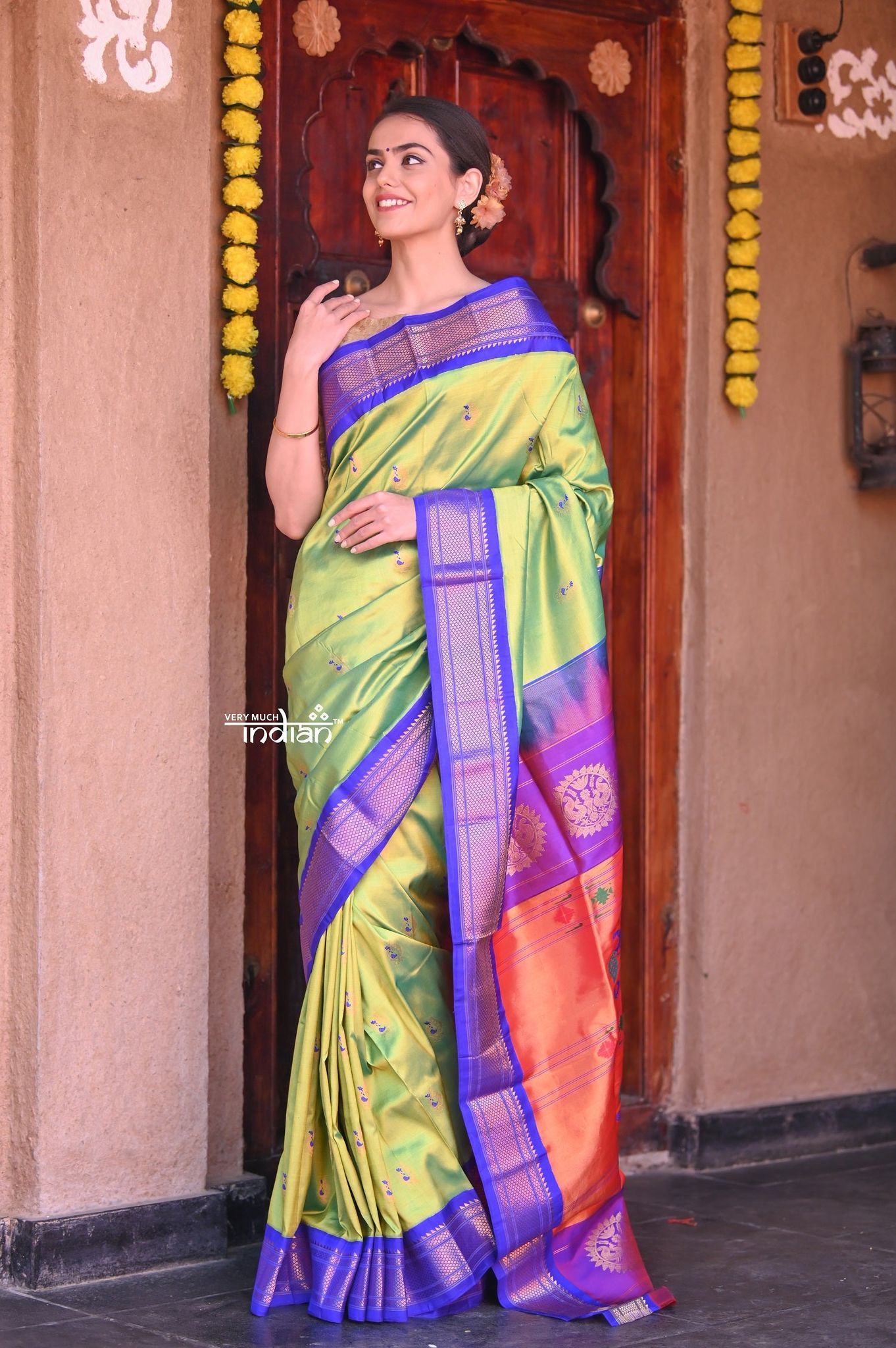 Raaga~ Traditional Handloom Pure Silk Soothing Green Maharani Paithani with Purple Border