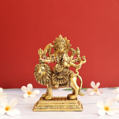 Handcrafted Goddess Durga idol in Pure Brass Devi Maa Sitting On The Lion - 7 Inch Height Handcrafted Goddess Durga idol in Pure Brass Devi Maa Sitting On The Lion - 7 Inch Height