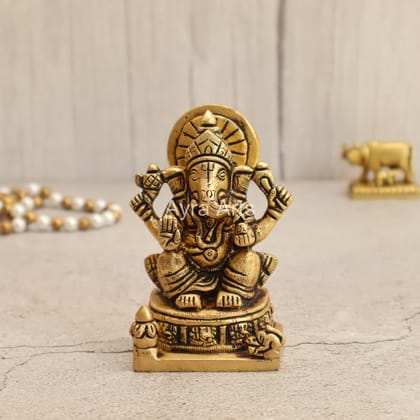 Buy Brass Vinayaka Statue Sitting On Round Ashta Ganesha Base - 4 Inch Height Buy Brass Vinayaka Statue Sitting On Round Ashta Ganesha Base - 4 Inch Height