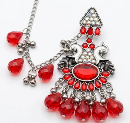 Vardaan Crystalx Exquisite oxidized silver Sahara earring featuring vibrant ruby-red crystals and intricate detailing, perfect for every women. Vardaan Crystalx Exquisite oxidized silver Sahara earring featuring vibrant ruby-red crystals and intricate detailing, perfect for every women.