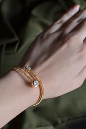 CRISS-CROSS GOLD CRYSTAL CUFF BRACELET