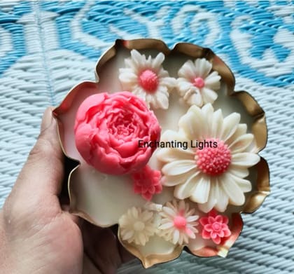 Pink and white floral urli candle