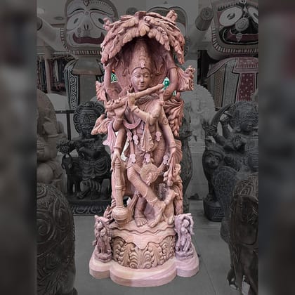 Lord Krishna with flute Pink Stone statue Lord Krishna with flute Pink Stone statue