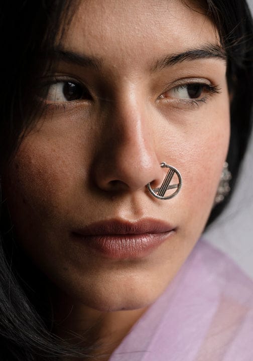 Cross over nose ring (left side)