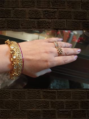 Intricate carving with ghunghroo cluster single ruby stone line openable kada(set of two)-2'4
