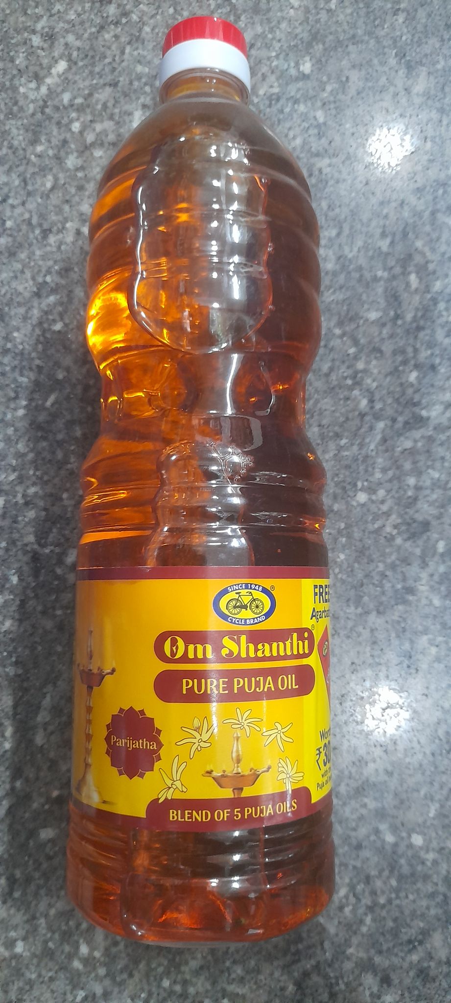 Cycle om Shanti pure Puja oil bottle