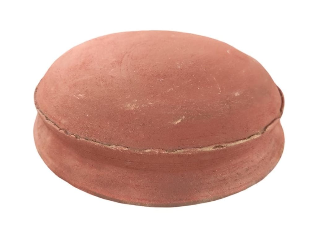 Handmade Clay Pot Lid with a Unique Design