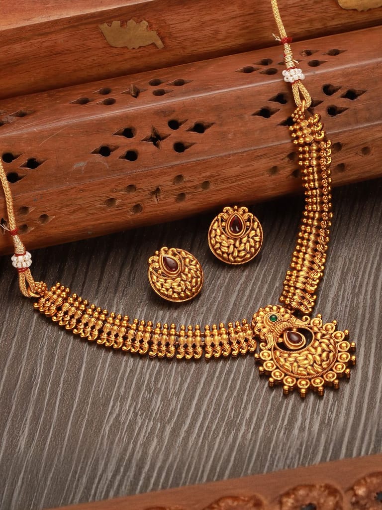 Gold plated Red Stone Studded Minimal Temple Choker jeellery Studds - Jewellery Sets | Buy online on ZillyBuy