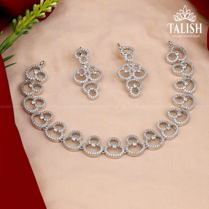 Elegant Silver-Plated Necklace and Earring Set with Intricate Circular Design and Sparkling American Diamond Stones