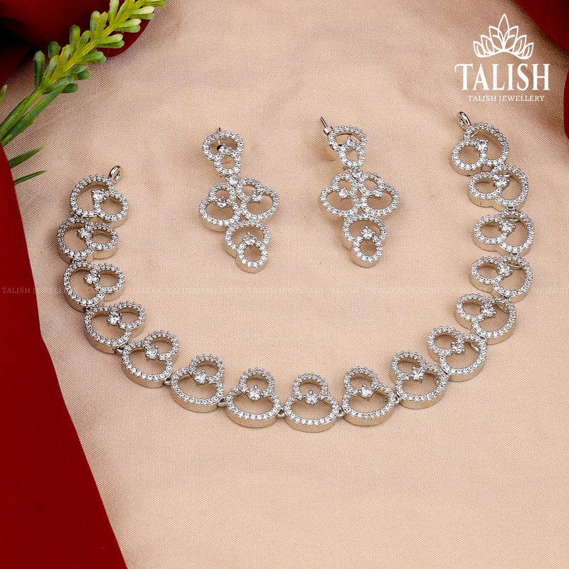 Elegant Silver-Plated Necklace and Earring Set with Intricate Circular Design and Sparkling American Diamond Stones