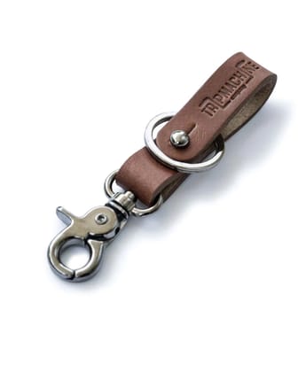 key fob with metallic black-vintage tan / in