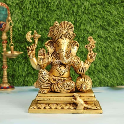 Brass Pagdi Ganesha Relaxing on Bloster Pillow -  7.2 Inch Height
