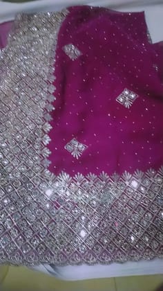 Elegant Pink Saree Set with Intricate Embroidery Elegant Pink Saree Set with Intricate Embroidery