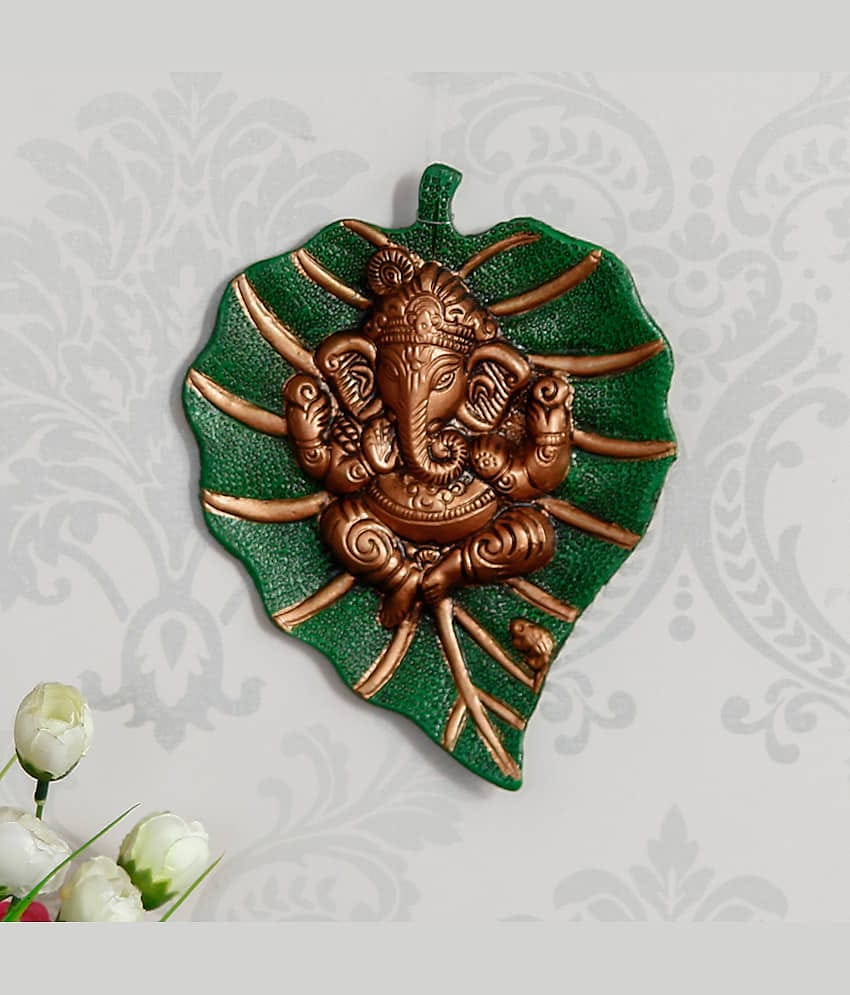 eCraftIndia Brown Lord Ganesha on Green Leaf Wall Hanging