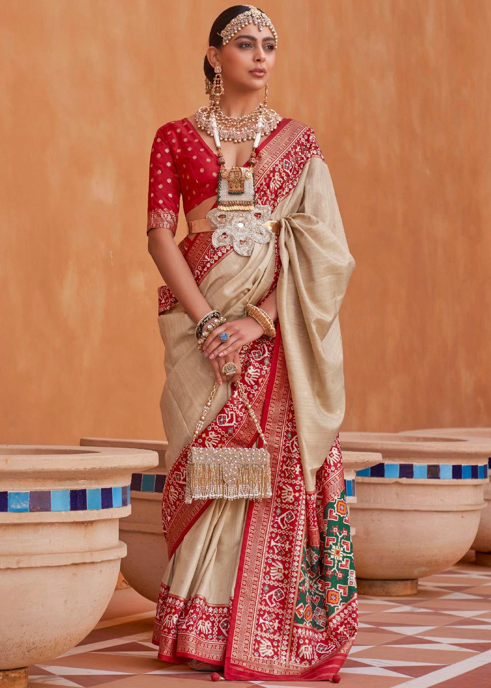 Beige And Red Woven Patola Silk Saree
