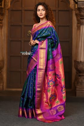 Chandrakor ~ Handloom Pure Silk Maharani Paithani with Majestic Maharani Pallu in Peacock Blue
