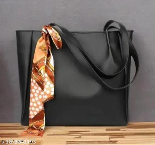 Elegant luxe black tote handbag with scarf