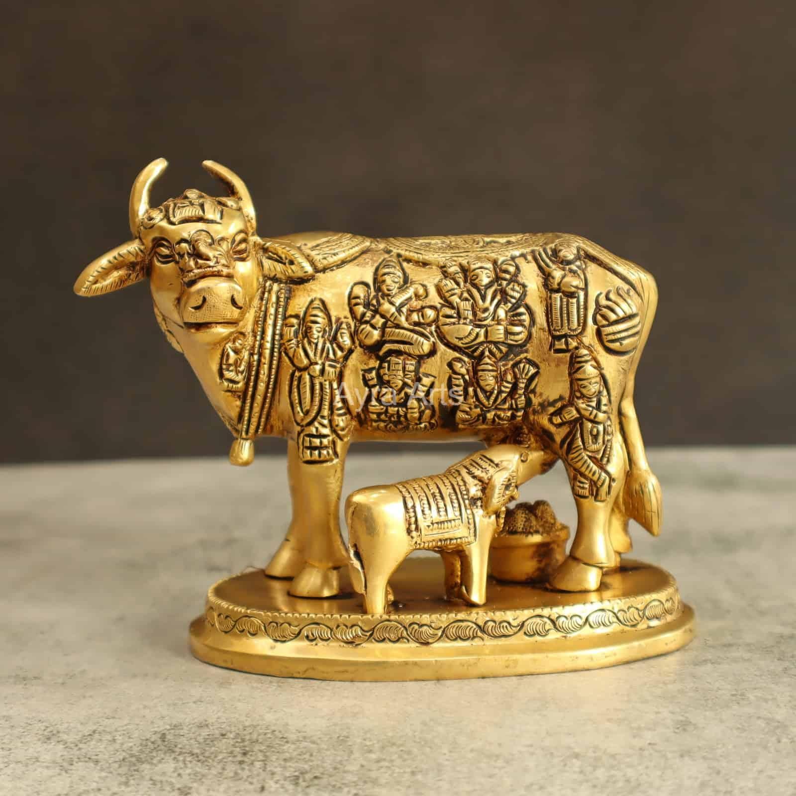 Brass Handcrafted Cow with Calf Engraved with Hindu Deities - 5.25 Inch Height
