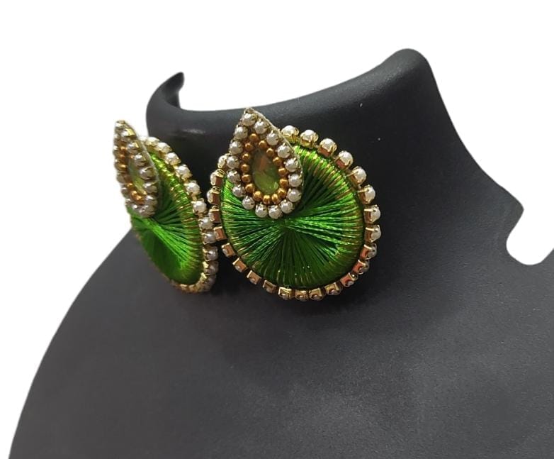 Green and gold round stud earrings with pearl and stone embellishment