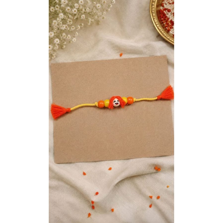 HANDCRAFTED KIDS - GIRL PLAYFUL SMILEY RAKHI