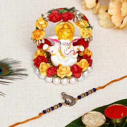 Designer Peacock Rakhi with Lord Ganesha Idol on Decorative Plate for Car & Home and Roli Chawal Pack