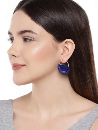 Gold-plated brass hoop earrings.