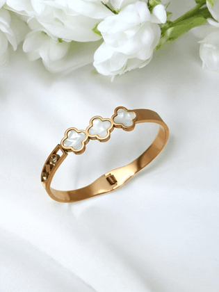 Gold Bracelet with White Flowers.
