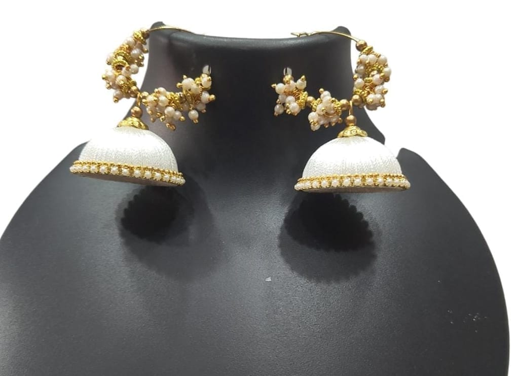 White Jhumka Earrings with Pearl and Gold Accents