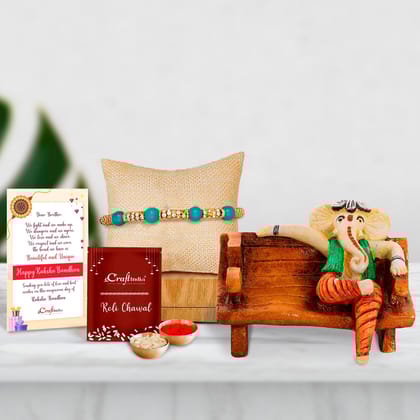 Designer Pearl Rakhi with Lord Ganesha in McDonald Style Visiting Card Holder and Roli Chawal Pack, Best Wishes Greeting Card