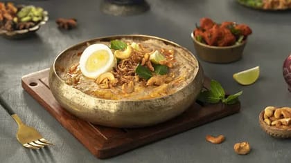 Haleem With Chicken 65 And Egg Topping