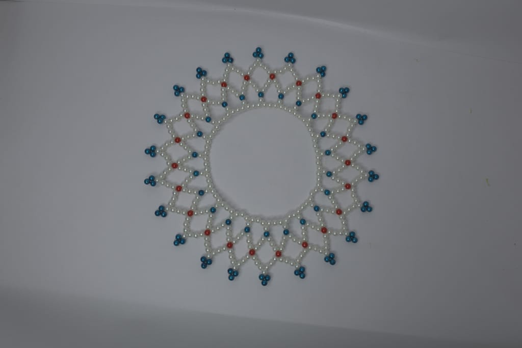 Pearl Diya Rangoli (Mahirap)