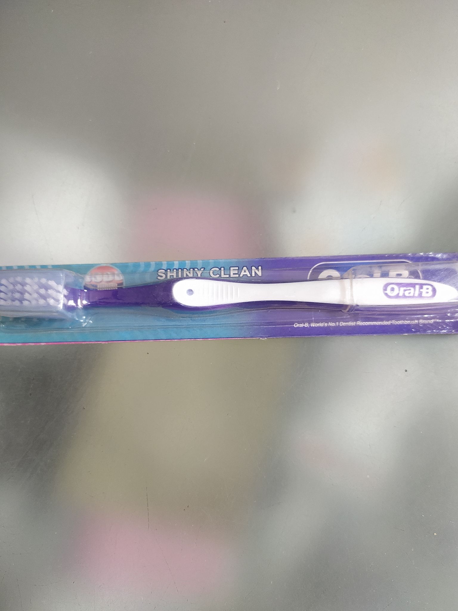 Shiny clean Ora world's Oral-b 